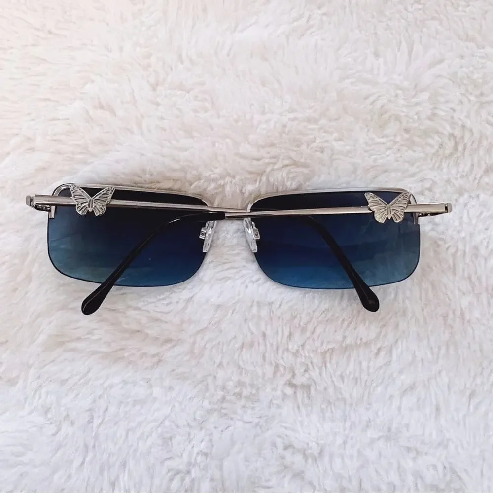 Delia Blue Rimless Butterfly Accent Sunglasses